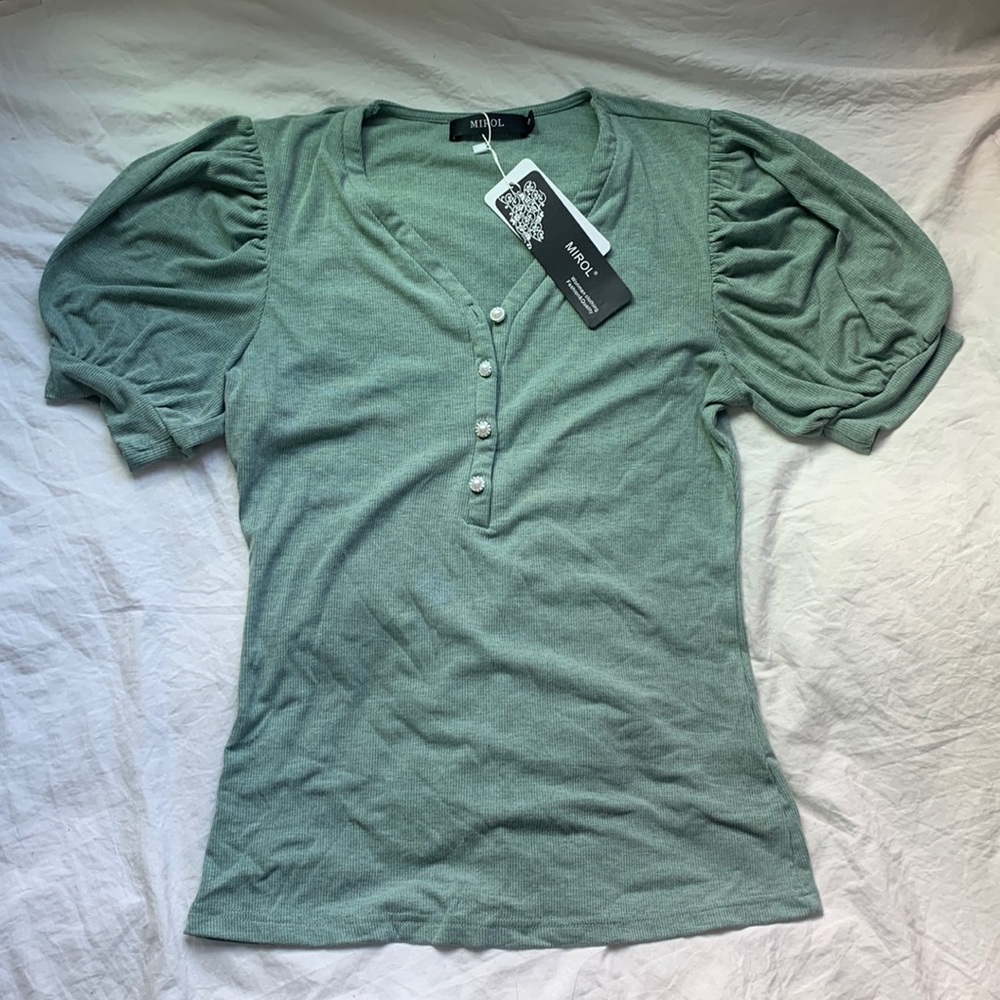 Cute green half button up top with puff sleeves.